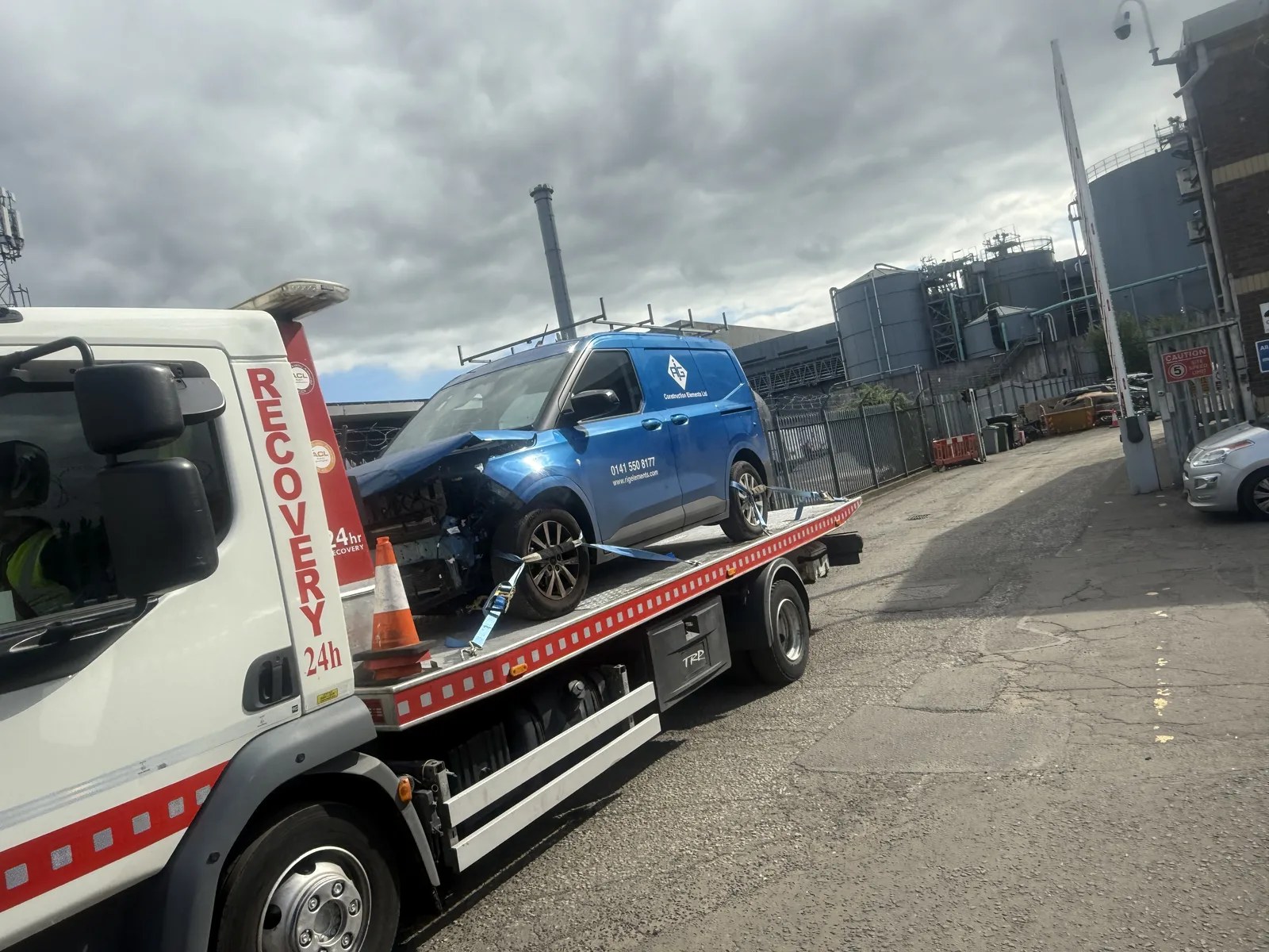 Commercial van recovery on tilt-and-slide truck in Glasgow