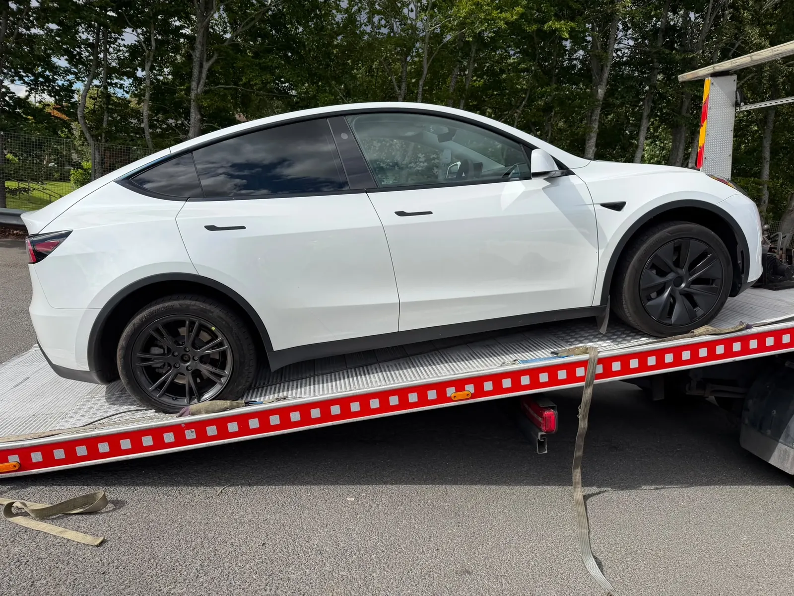 Tesla on Lifesaver flatbed